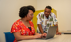 Sylvia Perry with IPR graduate research assistant Jonathan Doriscar